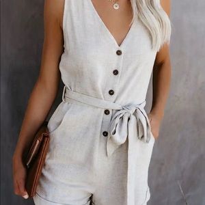 Pocketed button down romper - small - never worn brand new!